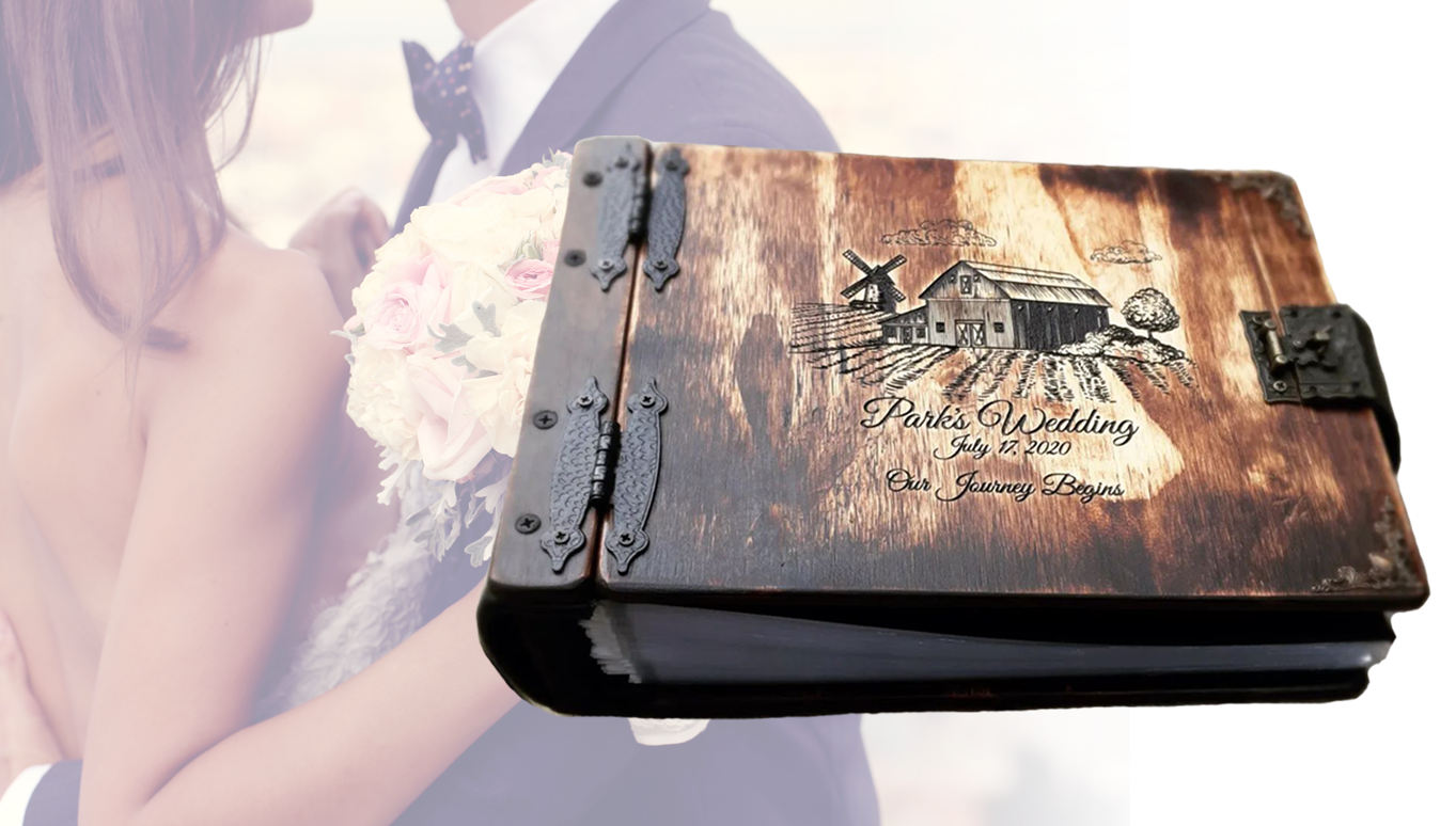 Personalized wooden book with engraved names and date, perfect for a traditional fifth wedding anniversary gift by Rustic Engravings