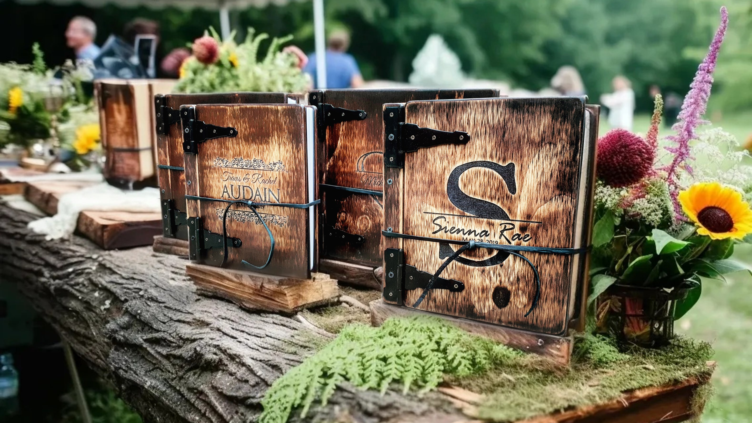 Rustic Engravings wedding guest books on display, perfect for capturing memories in style.