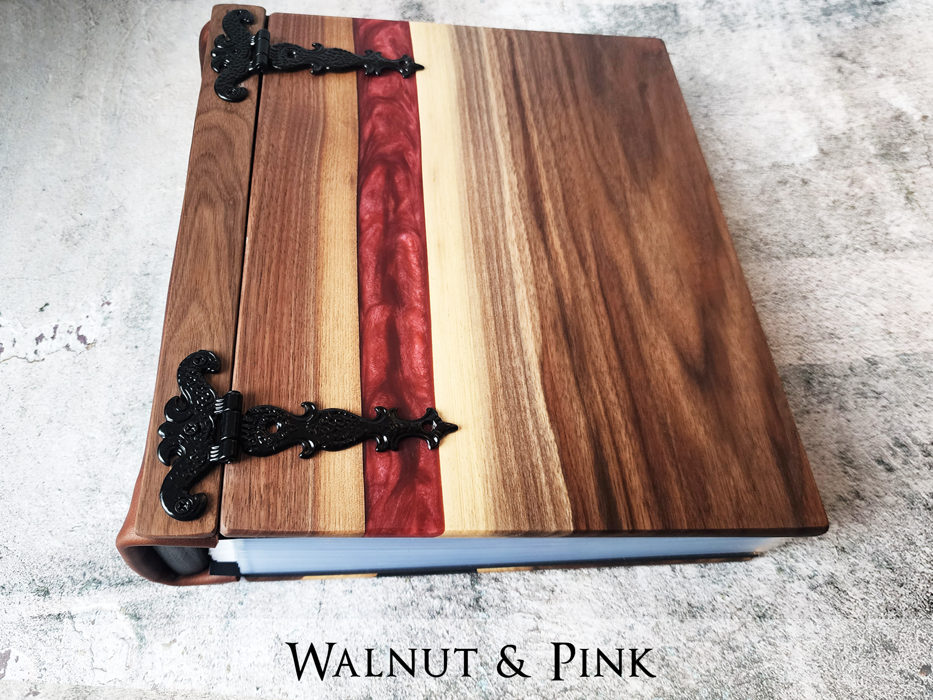  Preserve wine labels in style with a personalized collectors book featuring a river table wood and epoxy cover by Tylir Wisdom at Rustic Engravings.