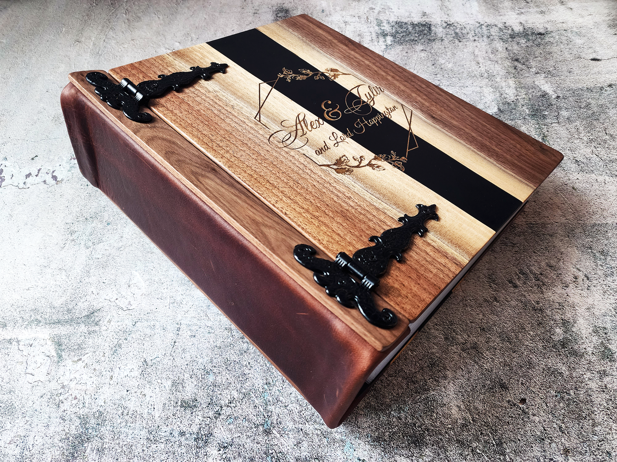  Personalized wedding guest book with river table wood cover by Tylir Wisdom at Rustic Engravings.