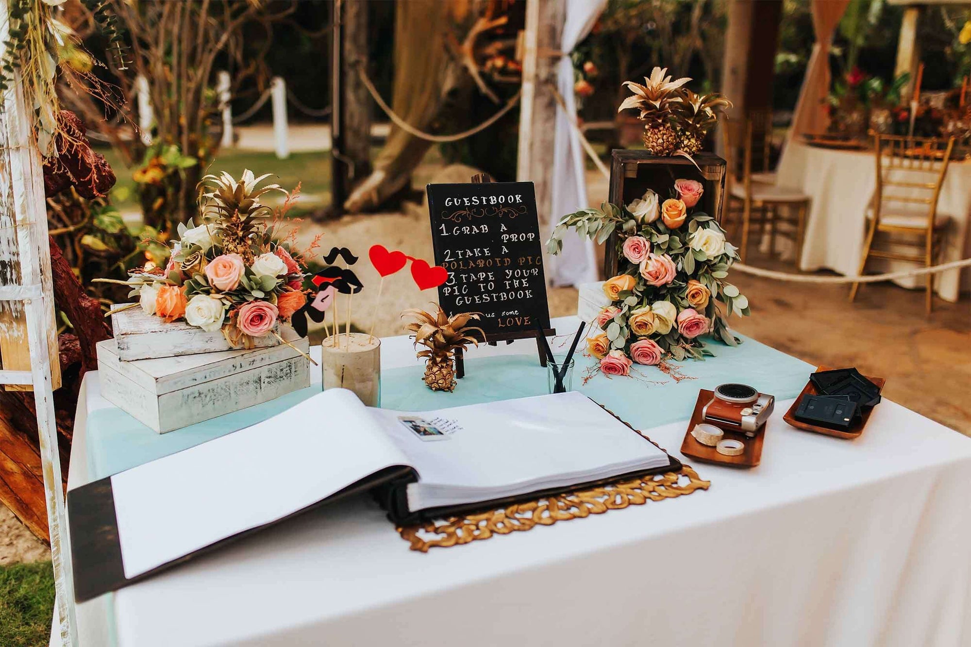 rustic engravings wedding guestbook displayed at wedding table