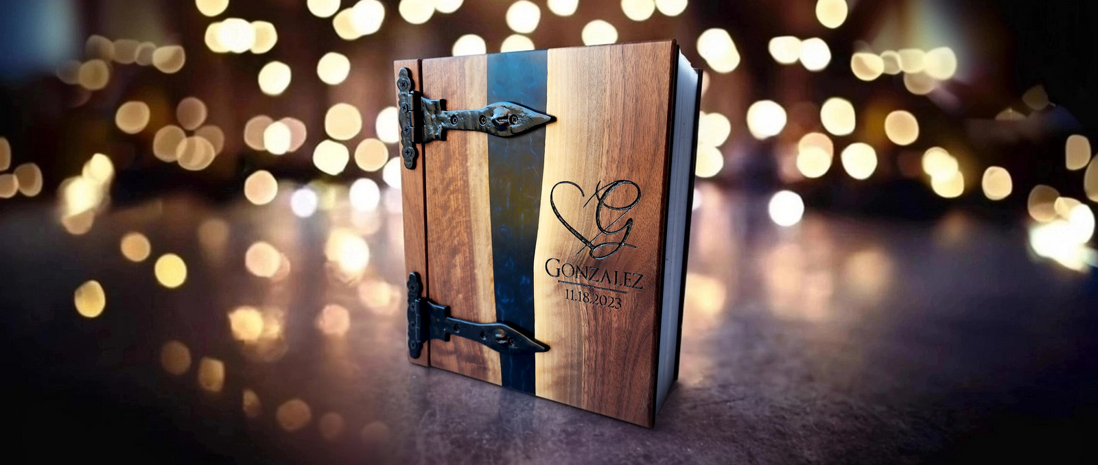 Elegant wooden photo album with decorative metal clasp, personalized with the name Gonzalez and the year 2023.