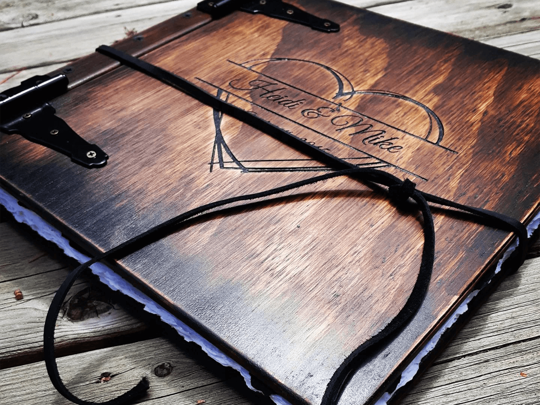 Wedding Anniversary Memory Book - Engraved fifth wedding anniversary photo album gift, handcrafted by Tylir Wisdom at Rustic Engravings | Commemorate your special moments with this exquisite anniversary book finely crafted with a wood and top grain leathe